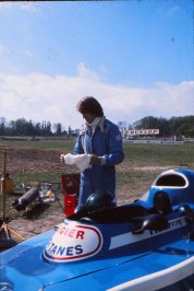 76r bh td jacques laffite suits up with ligier.jpg