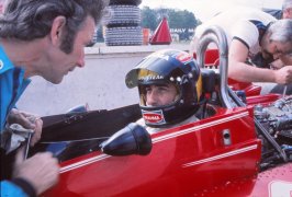 76r bh td carlos pace in brabham talking  with crewchief.jpg