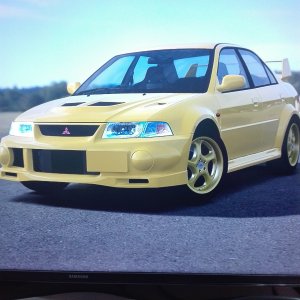 Mitsubishi Lancer Evolution IV GSR yellow