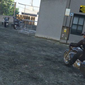 Revolver Bobcat makes themselves useful during a biker business sale 11