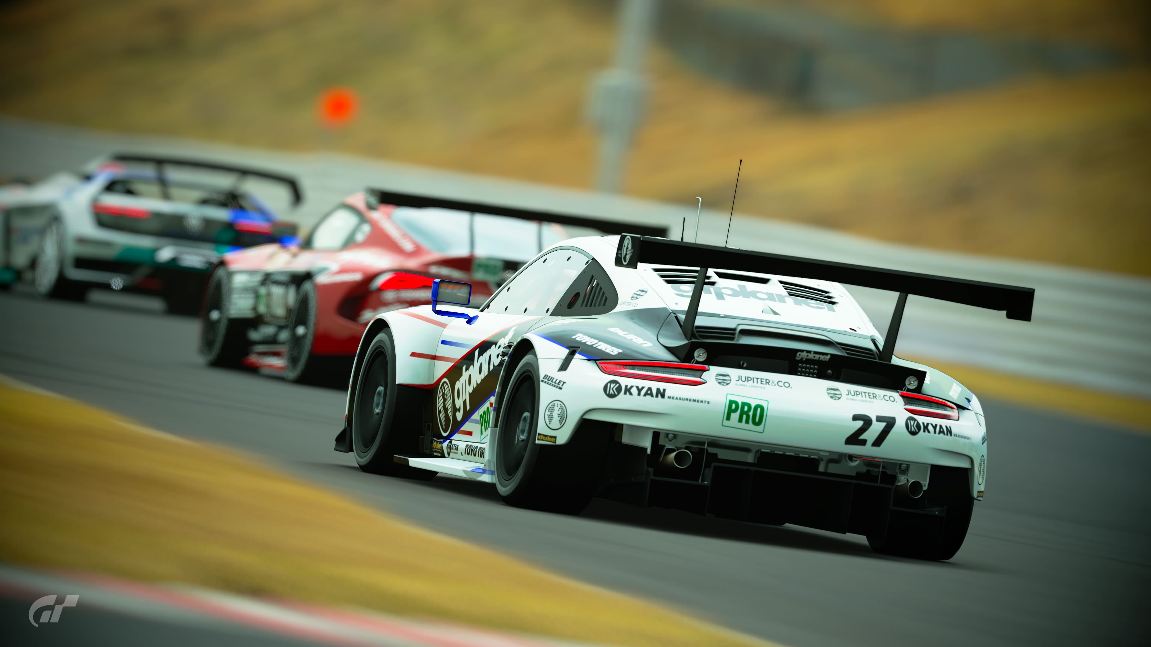 #27 GTPlanet Racing on the hairpin exit
