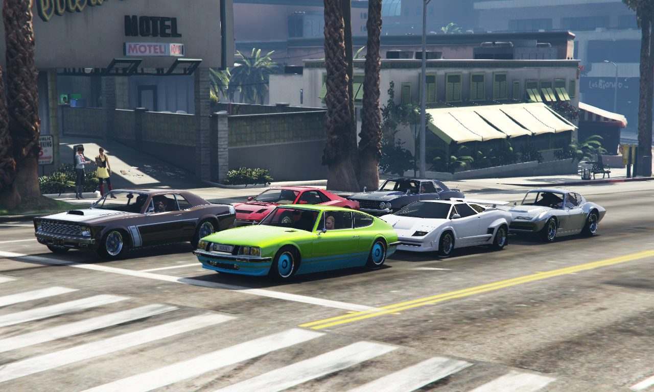 A small classic car race lining up 3