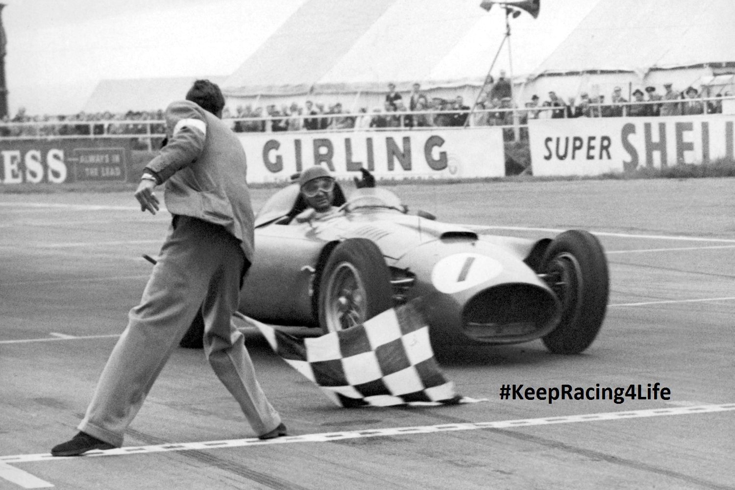 Juan Manuel Fangio Wins The 1956 British GP