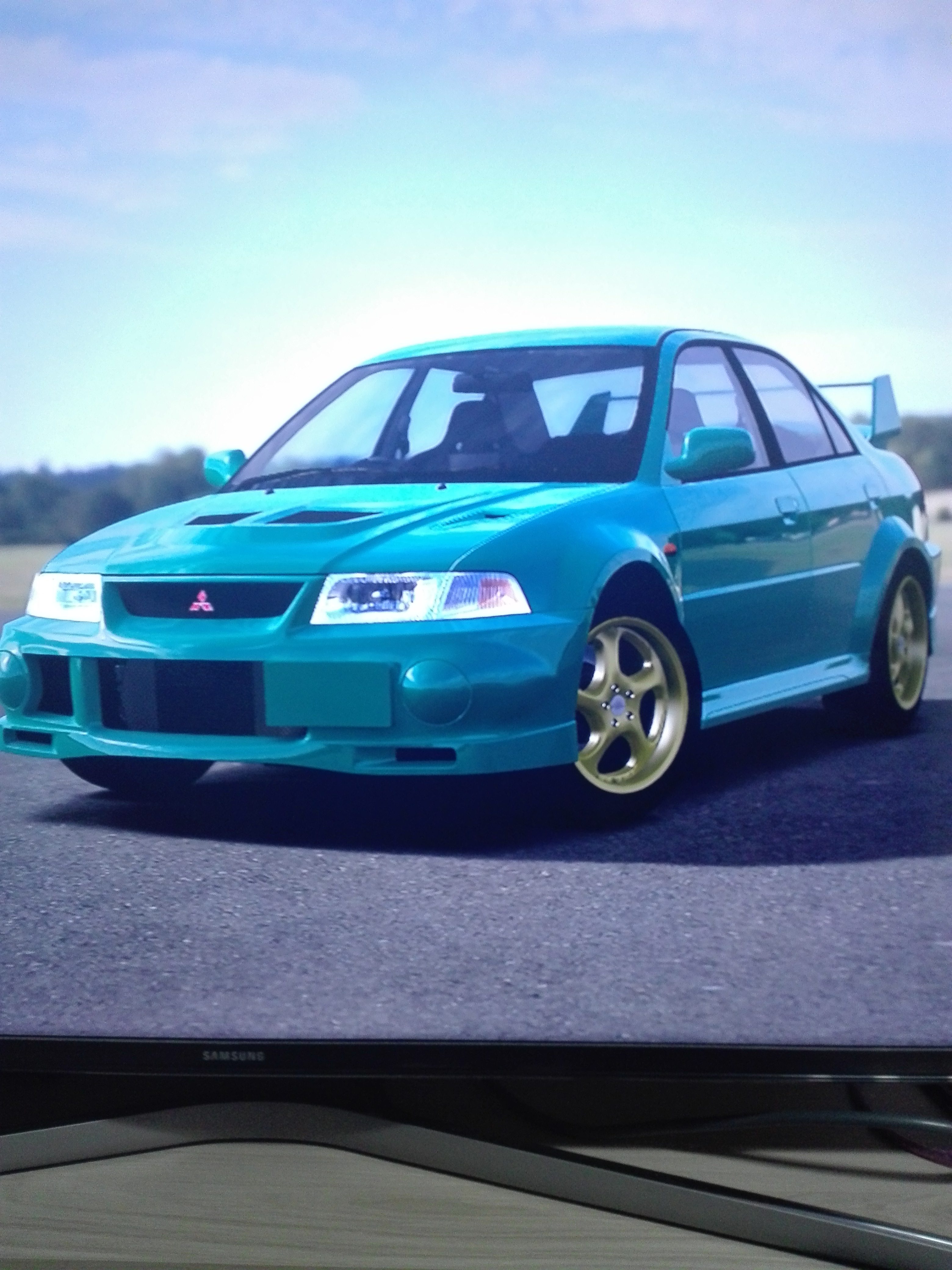 Mitsubishi Lancer Evolution IV GSR turquoise