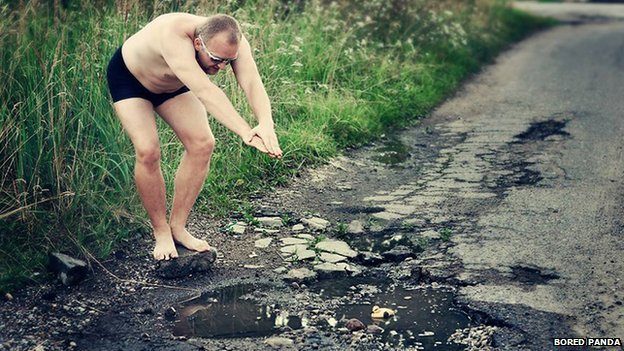 pothole diving man