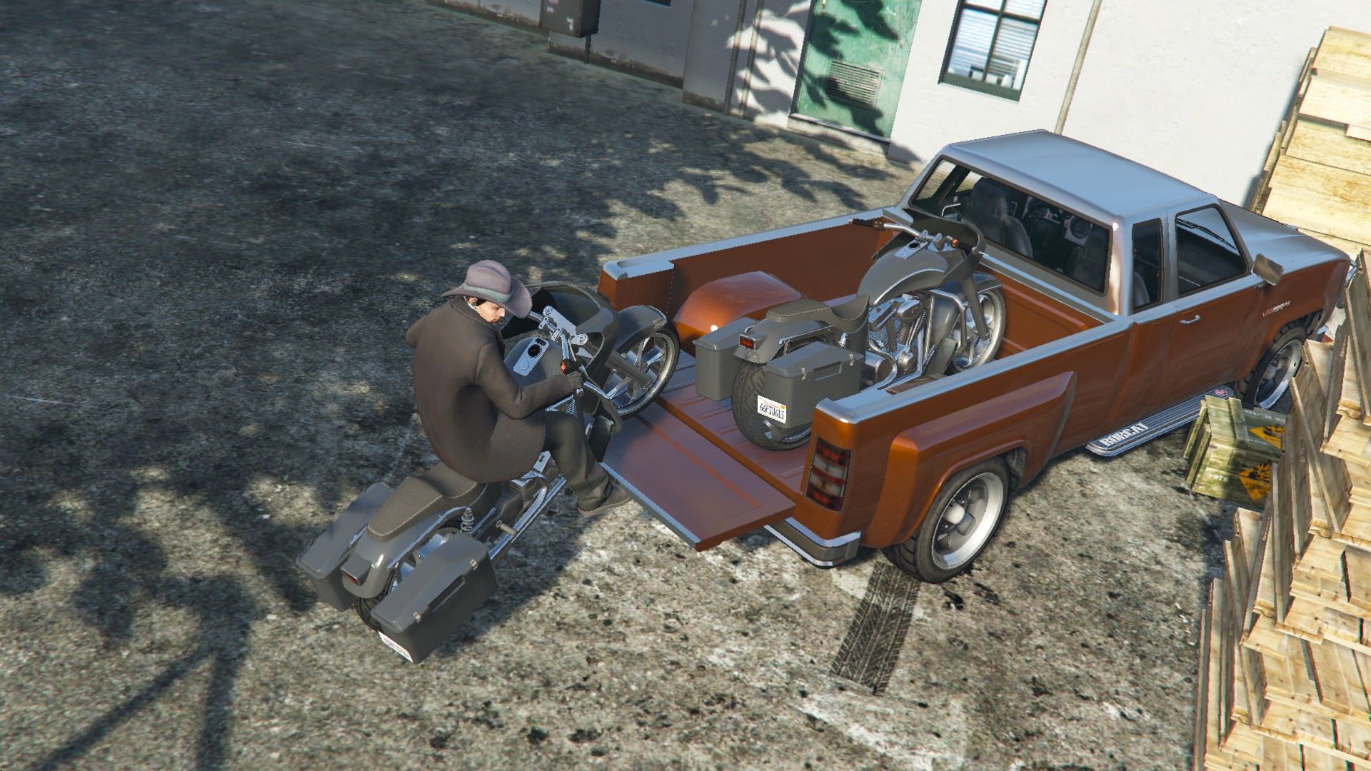 Revolver Bobcat makes themselves useful during a biker business sale 8