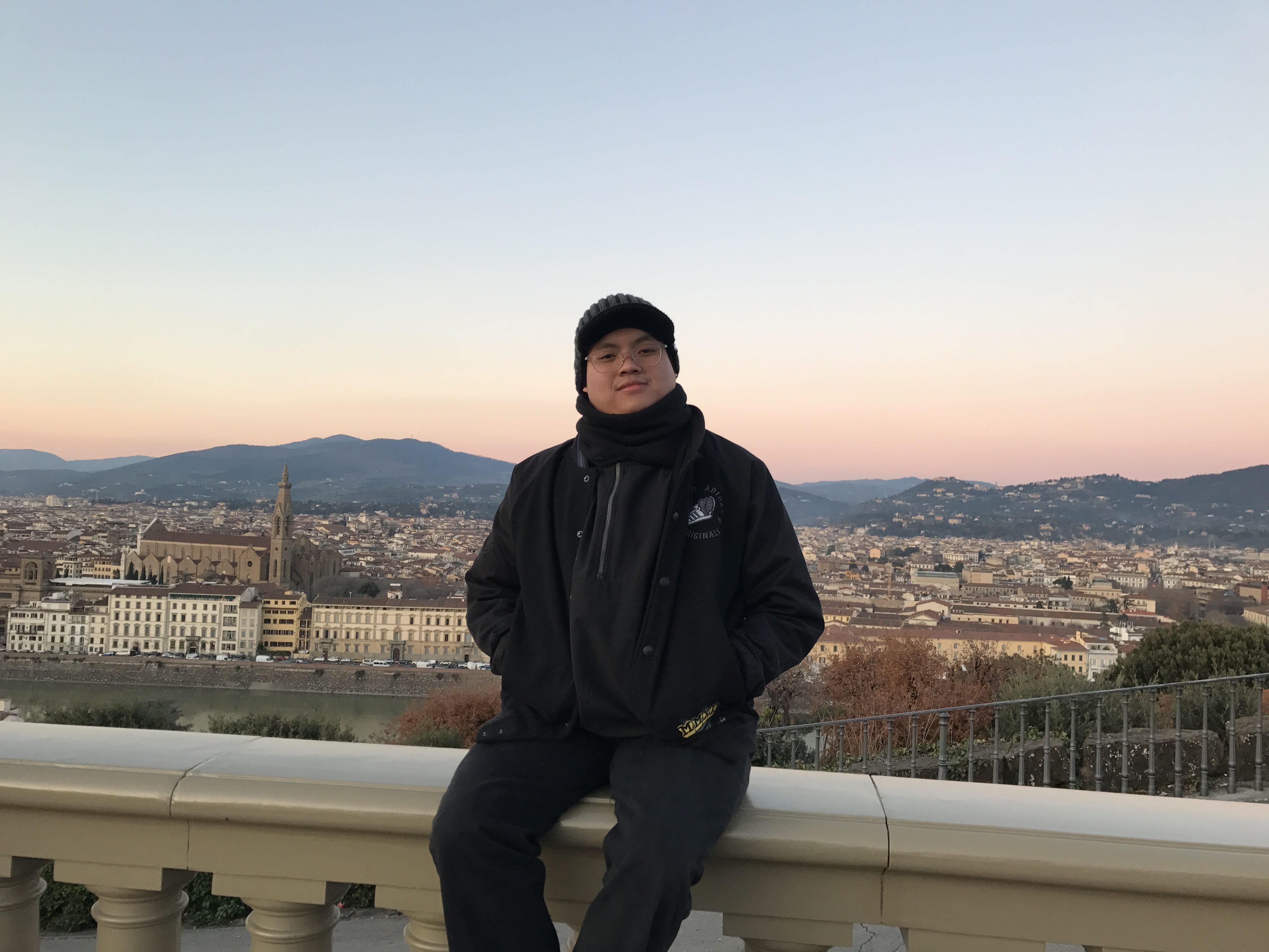 SPD sits by a fence from the Piazzale Michelangelo atop Firenze/Florence