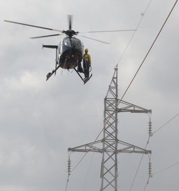 Helicopter-high-wire-maintenance-1.jpg