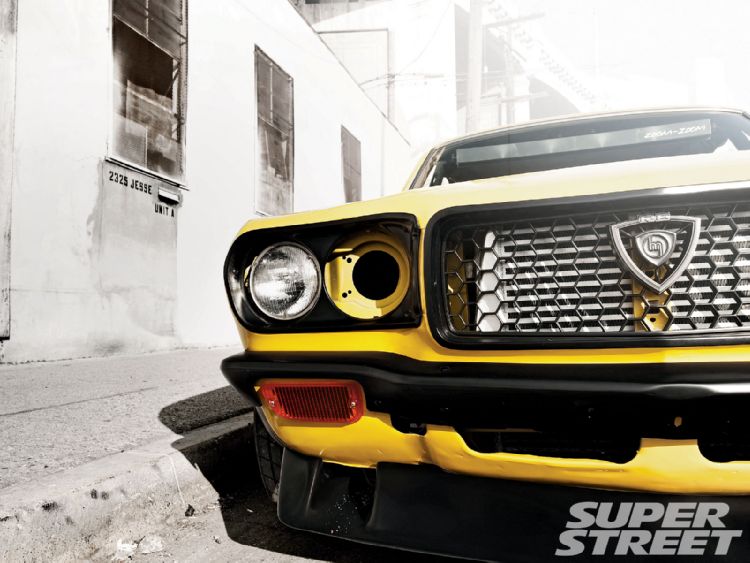 sstp_1002_04_o1973_mazda_rx_3re_badge1.jpg