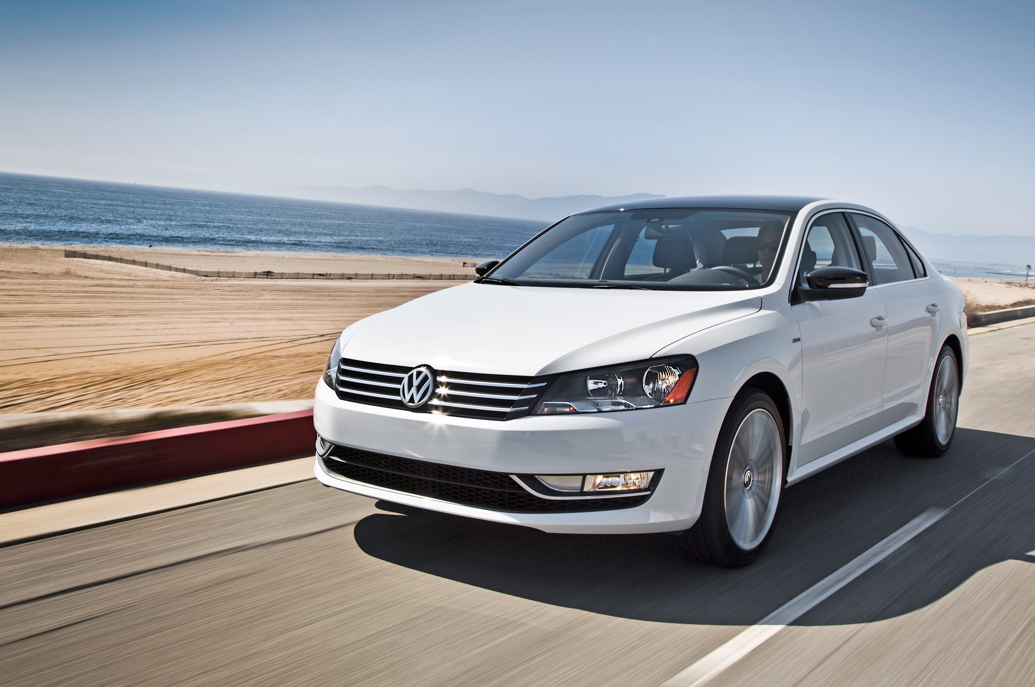 2014-Volkswagen-Passat-Sport-front-three-quarter-in-motion.jpg