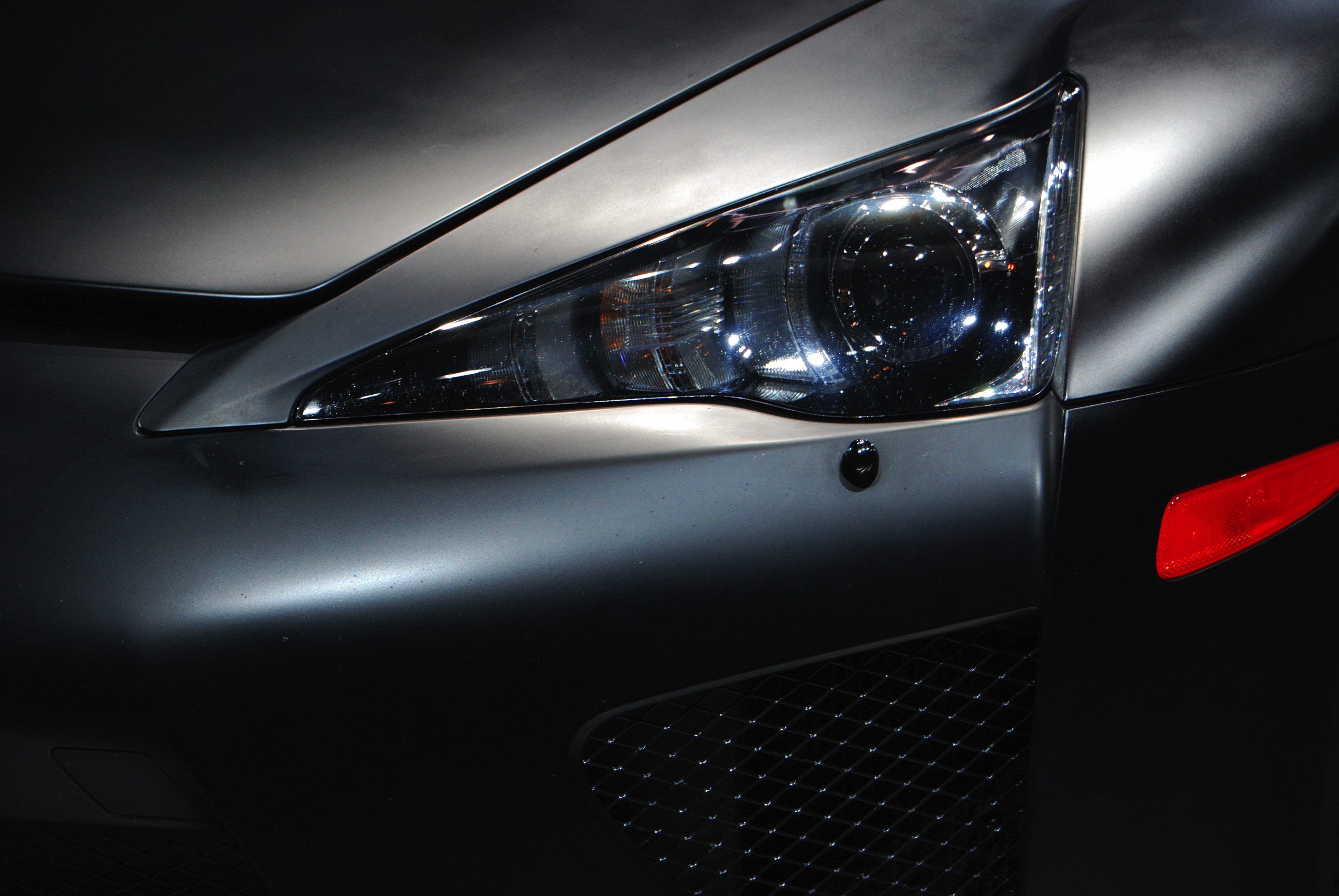 Lexus_LFA_Matte-Black_supercar_headlight.jpg