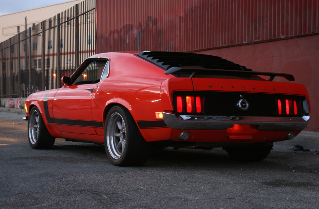 1970-Ford-Mustang-Boss-302-For-Sale-Headlights-Orange-Rear.jpg