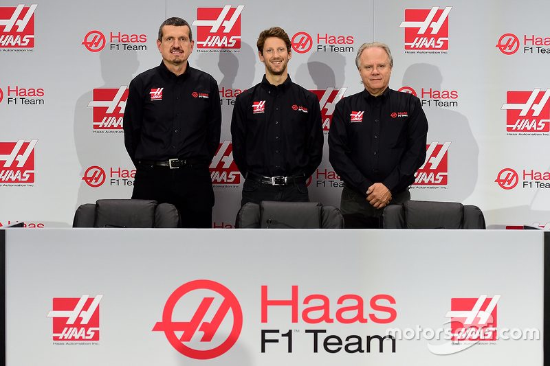 f1-haas-f1-team-driver-announcement-2015-haas-f1-team-s-gunther-steiner-romain-grosjean-an.jpg