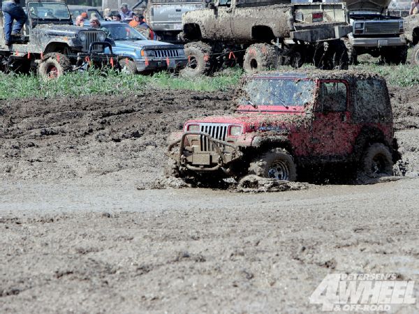 131_1009_04_o%2B131_1009_jeep_wrangler_yj%2Bfront_driver_side_mud.jpg