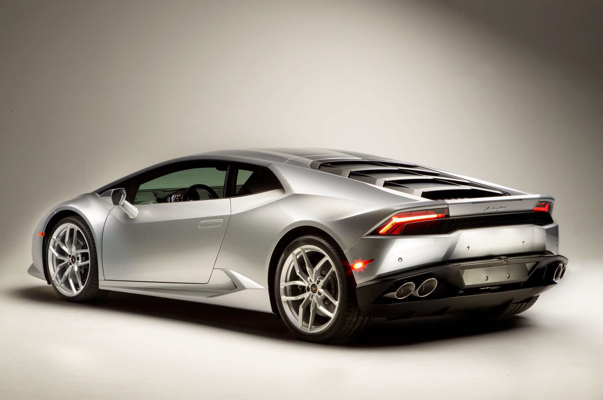 2015-lamborghini-huracan-rear-three-quarters.jpg