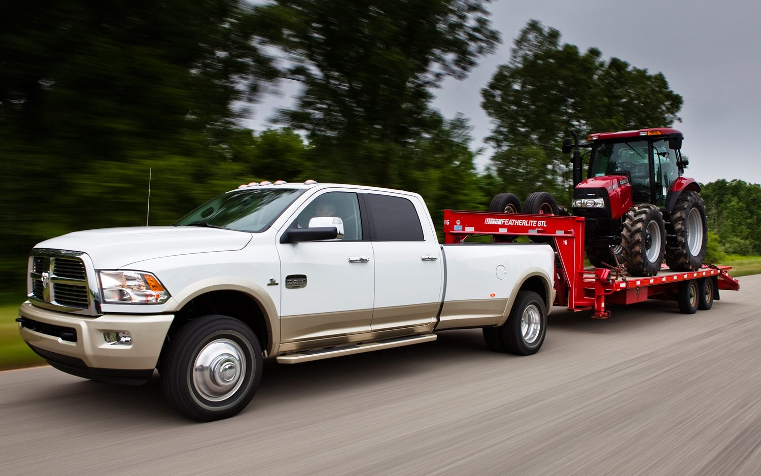 2012-ram-3500-heavy-duty-front-three-quarters-towing-in-motion.jpg