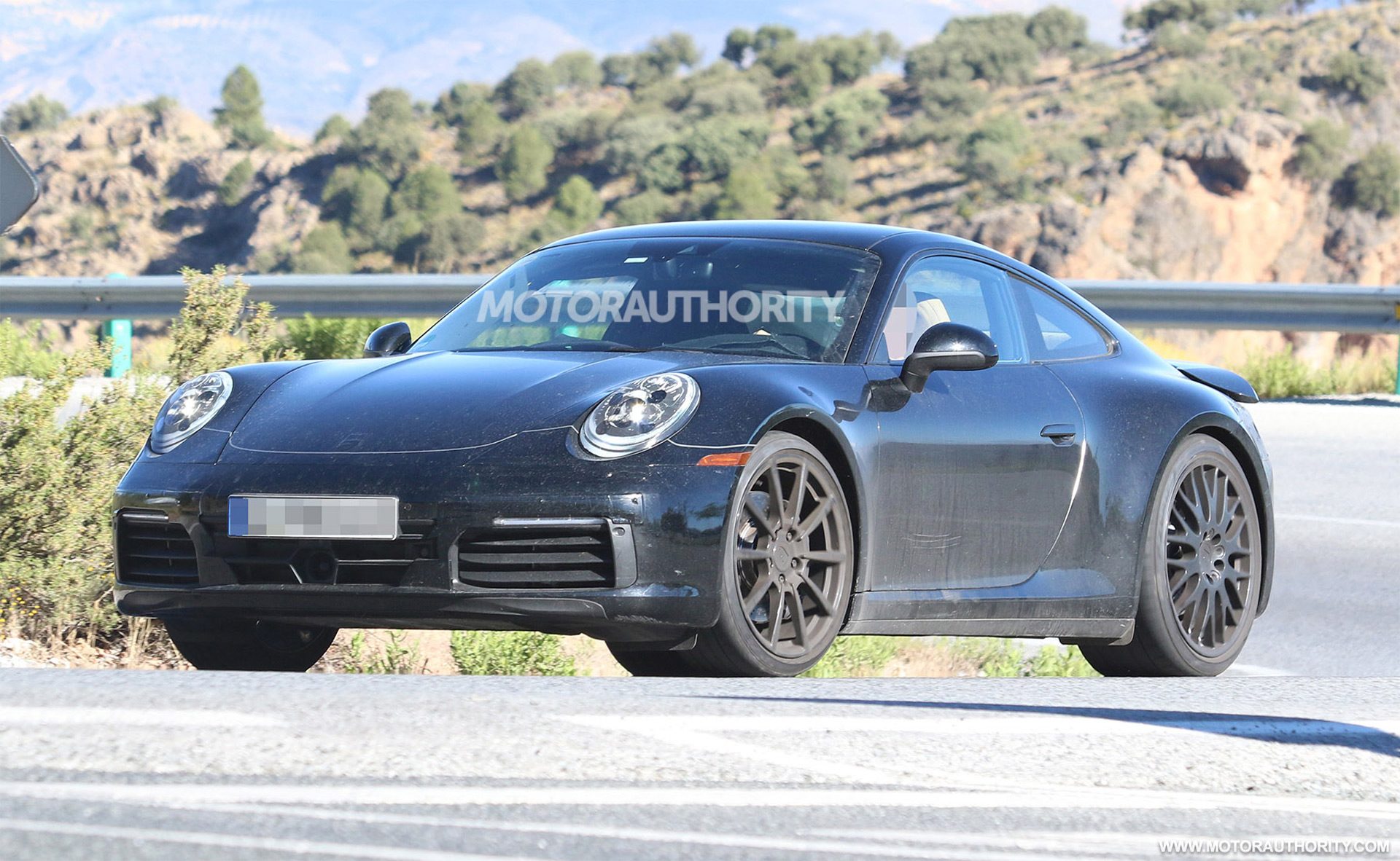 2019-porsche-911-spy-shots--image-via-s-baldauf-sb-medien_100612762_h.jpg