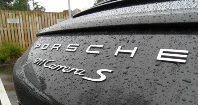 2012-Porsche-911-Carrera-S-logo.jpg