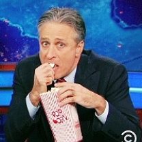 Jon-Stewart-Eagerly-Watching-Eating-His-Popcorn-On-The-Daily-Show_208x208.jpg