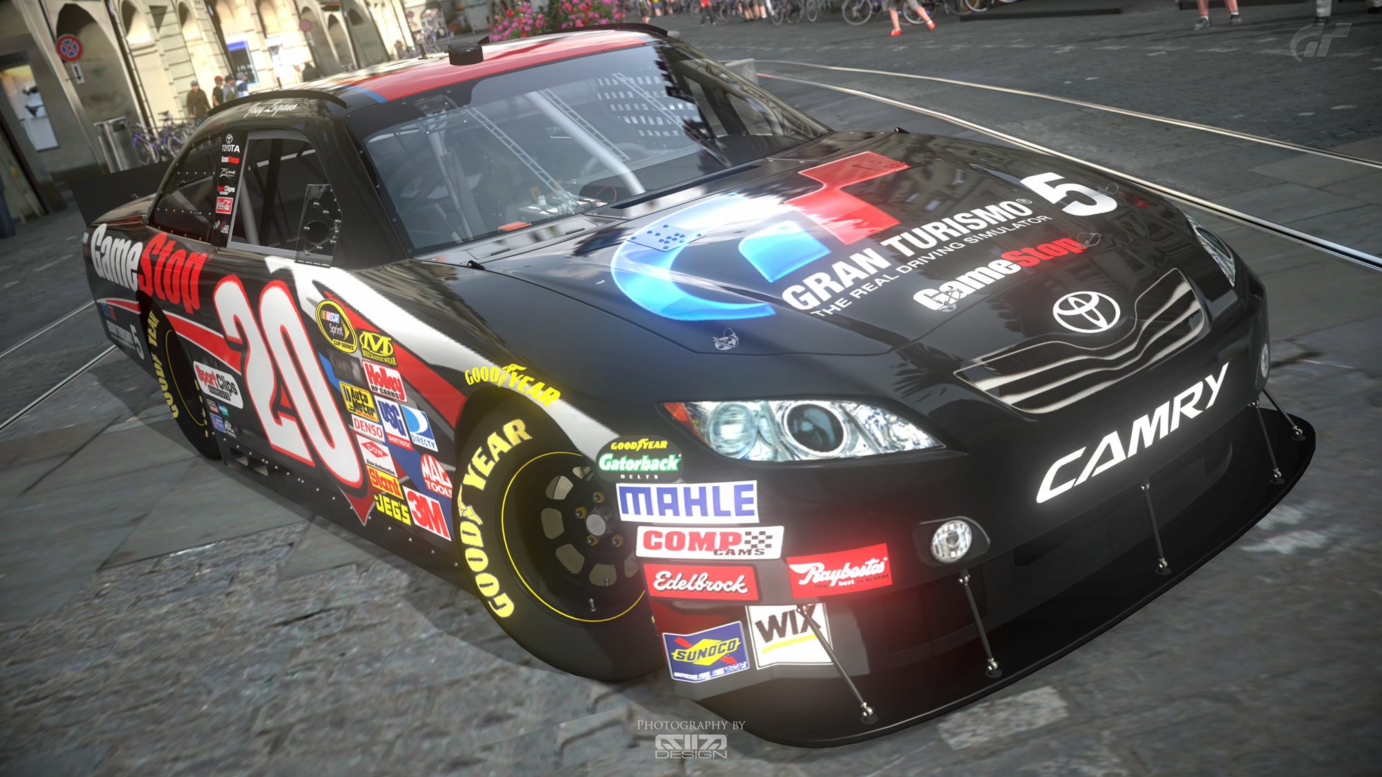 toyota_2010_joey_logano__20_gamestop_camry___f02_by_m2m_design-d670bag.jpg