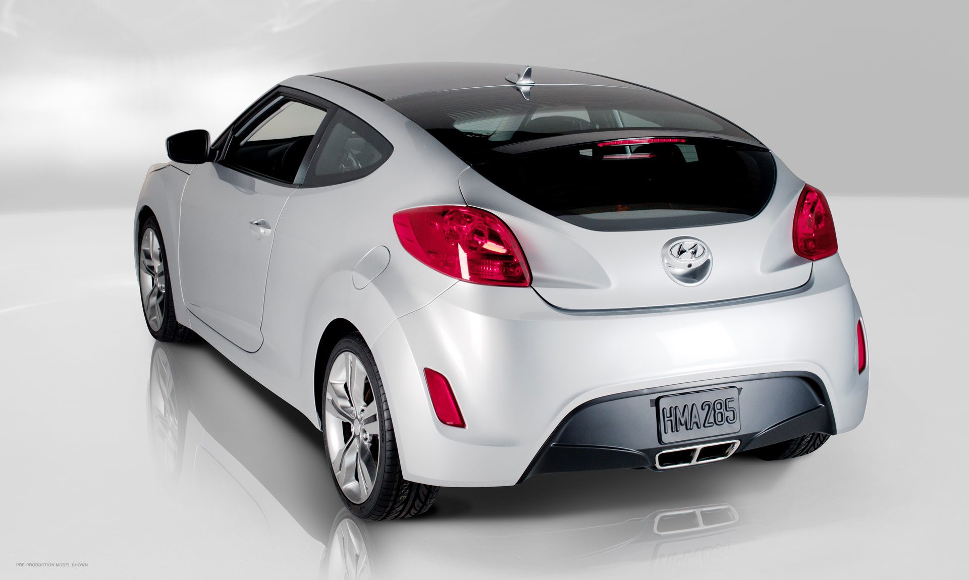 2012-Hyundai-Veloster-Rear-Side.jpg