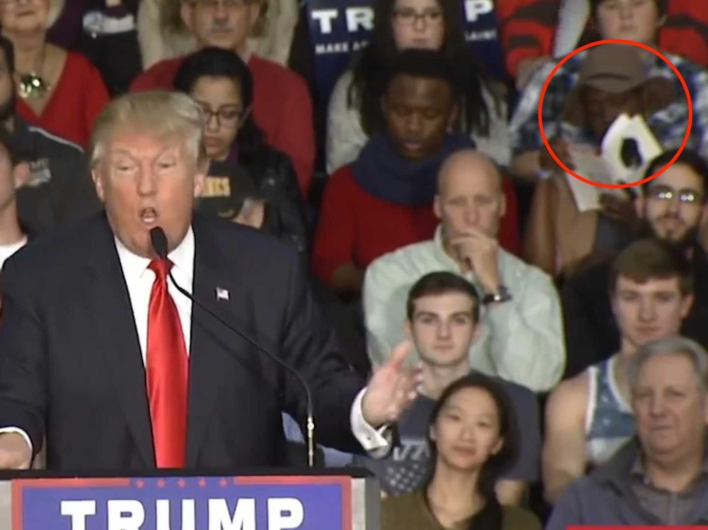 this-woman-got-a-prime-seat-at-a-trump-rally-and-spent-the-whole-time-reading-a-book-about-racism.jpg