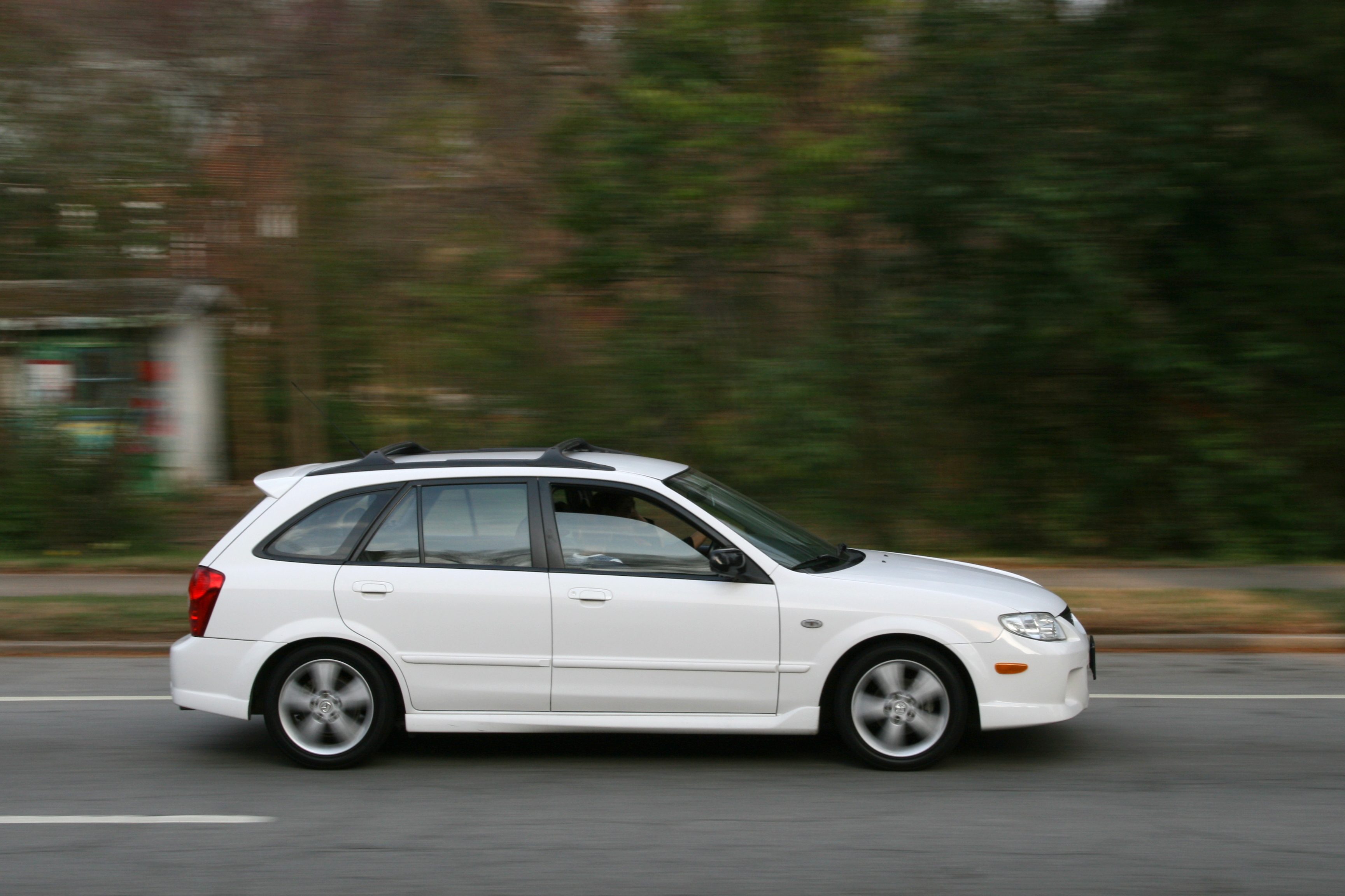 2009-03-11_White_Mazda_Protege_SB_on_N_Gregson_St_in_Durham.jpg