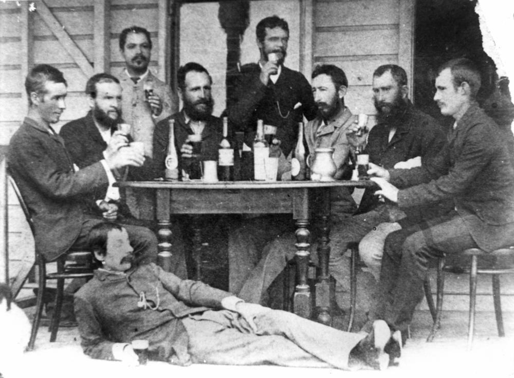StateLibQld_1_93512_Group_of_gentlemen_enjoying_a_drink_at_Winton,_ca._1895.jpg