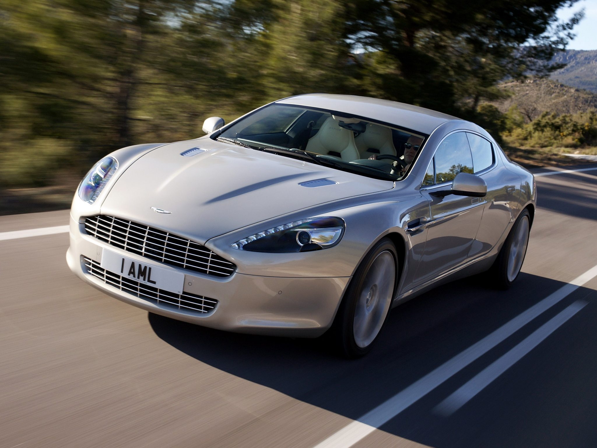 aston_martin_rapide_2009_silver_front_view_asphalt_30358_2048x1536.jpg