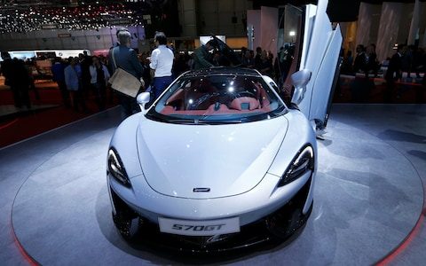 91566670_McLaren_570GT_car_is_seen_at_the_86th_International_Motor_Show_in_Geneva_Switzerland_Ma_trans_NvBQzQNjv4BqENh0amqpuv8Z5e8_LKlob_Z9qWXd1J7GJt_jAl0YuAU.jpg