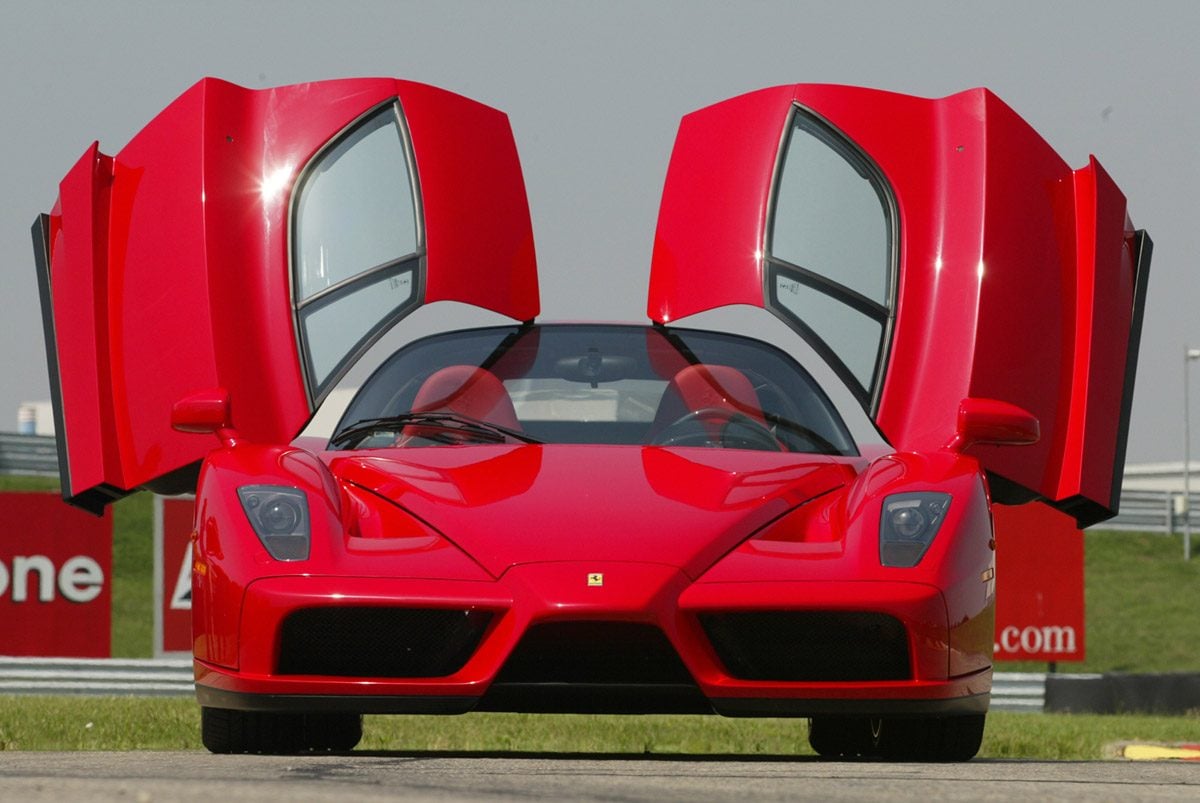 ferrari-enzo-doors-open-front-track.jpg