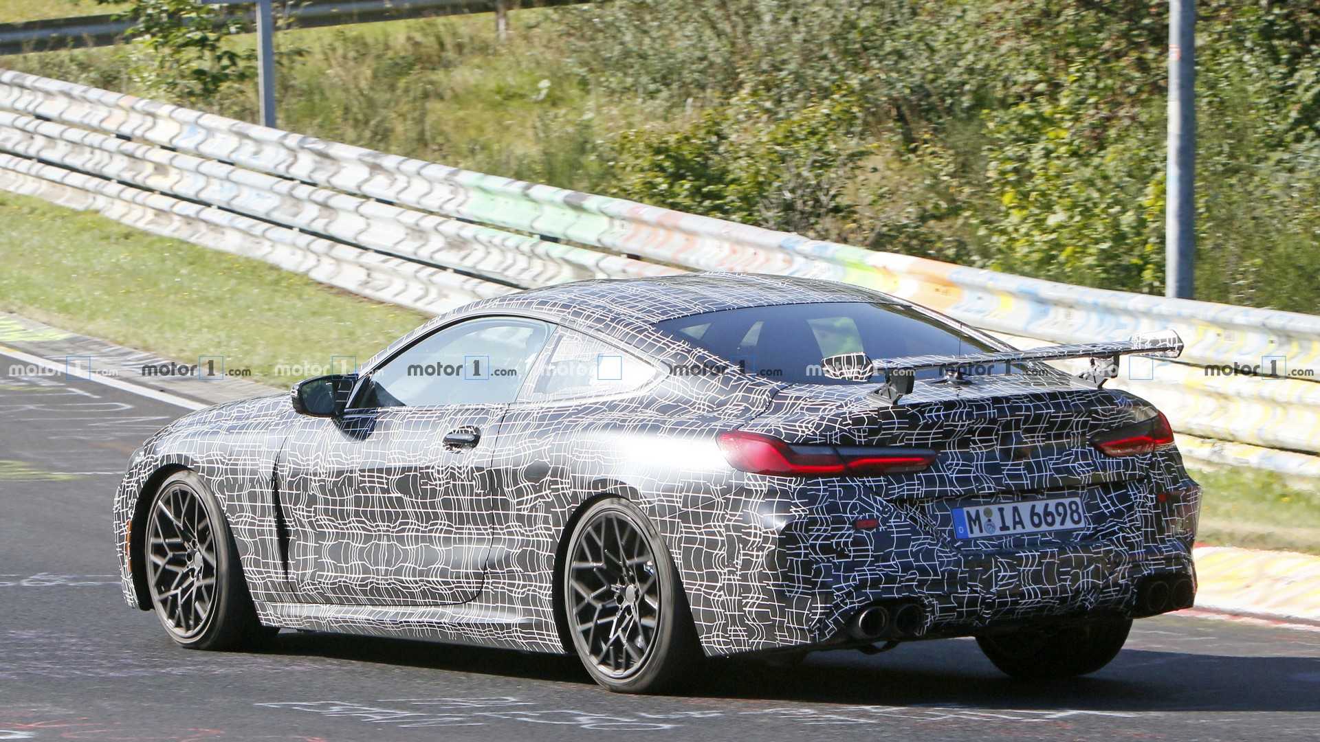 bmw-m8-with-additional-rear-wing-spy-photo.jpg