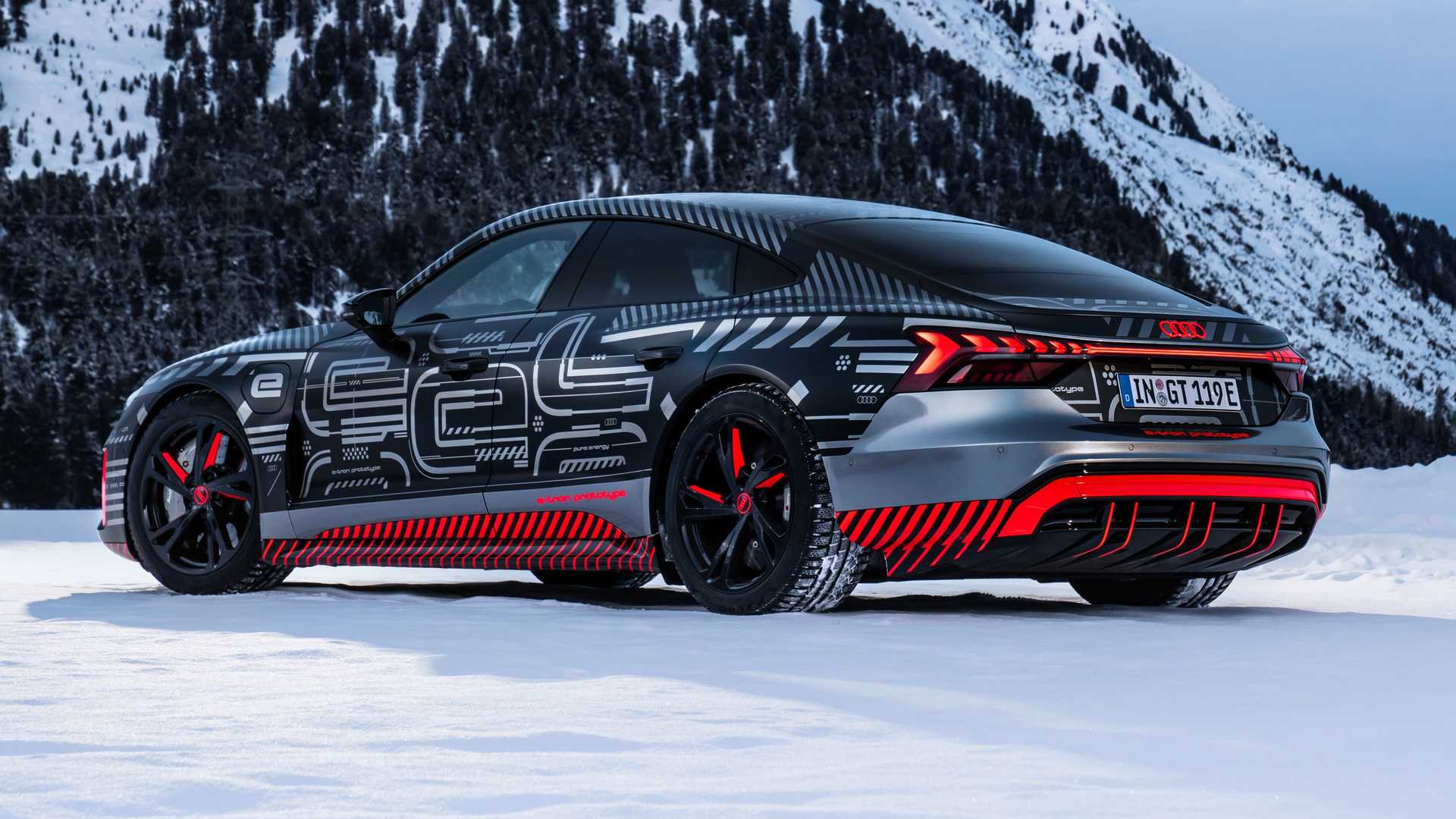 audi-e-tron-gt-teased-rear-side-snow.jpg