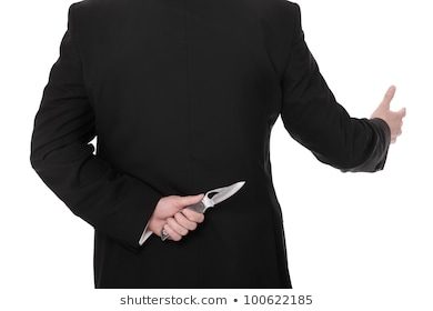 picture-businessman-hiding-knife-behind-260nw-100622185.jpg