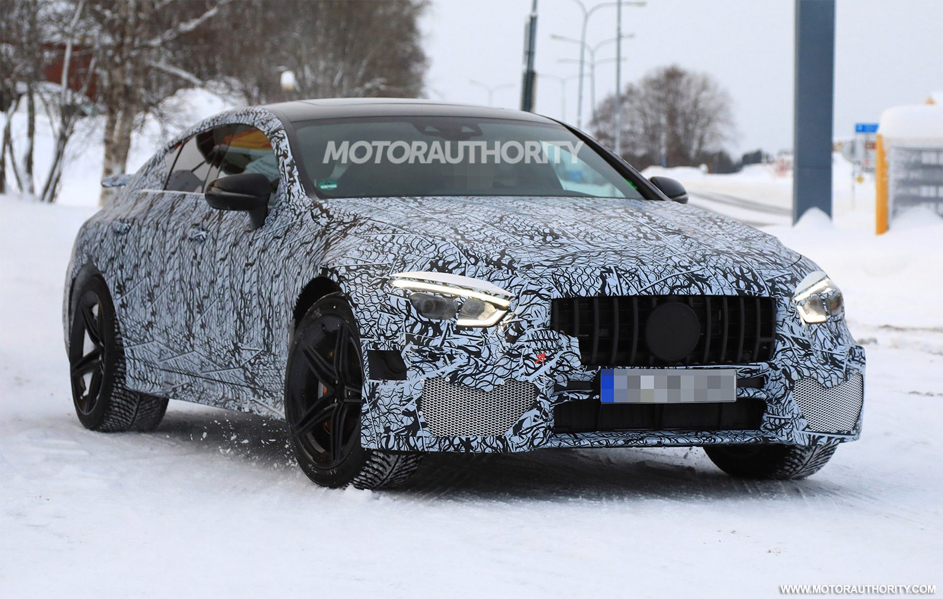 2019-mercedes-amg-gt-sedan-spy-shots--image-via-s-baldauf-sb-medien_100640957_h.jpg