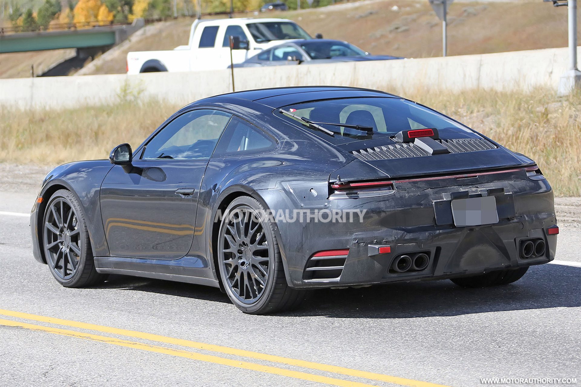 2019-porsche-911-spy-shots--image-via-s-baldauf-sb-medien_100625696_h.jpg