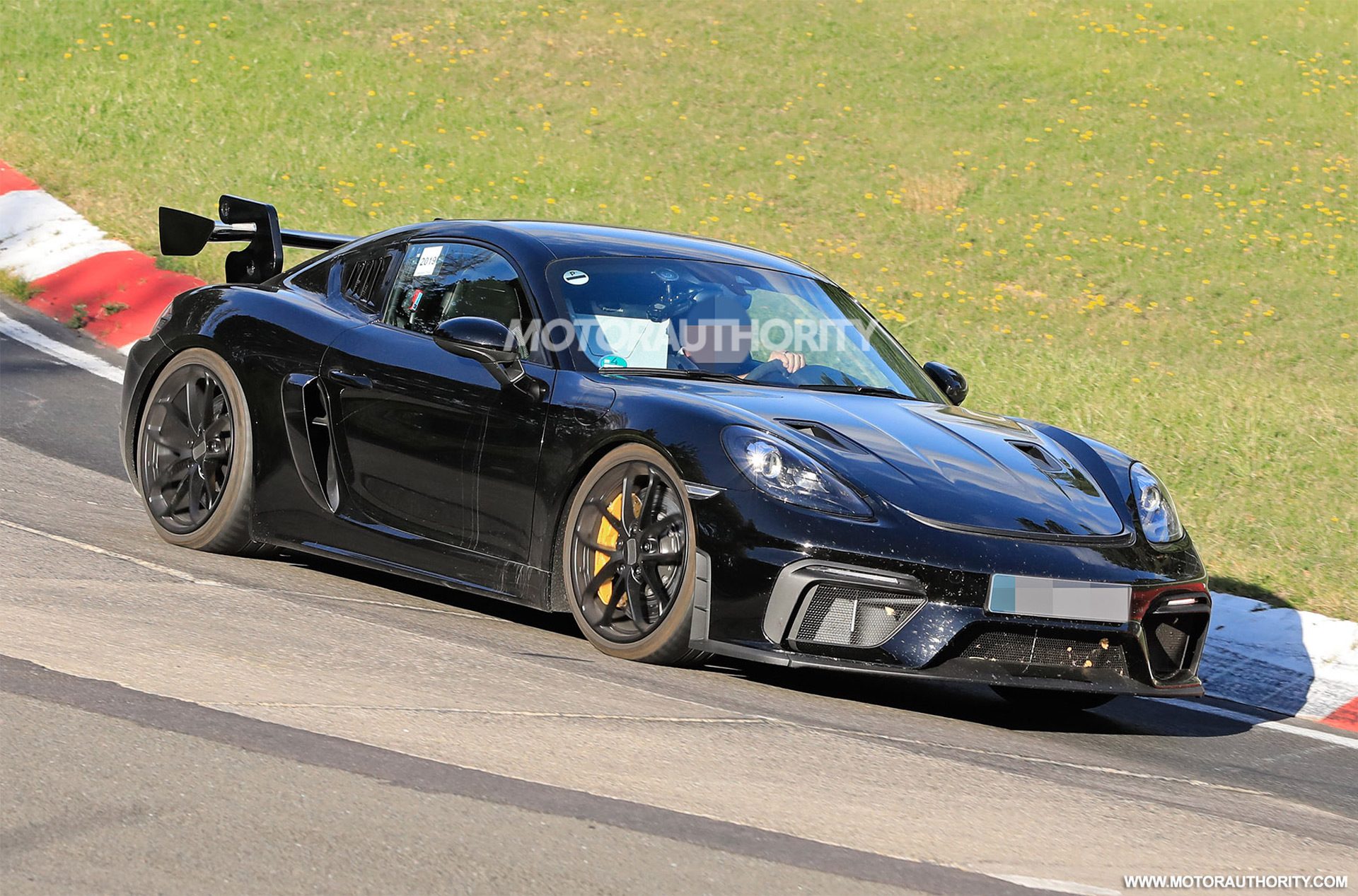 2021-porsche-718-cayman-gt4-rs-spy-shots--photo-credit-s-baldauf-sb-medien_100716772_h.jpg