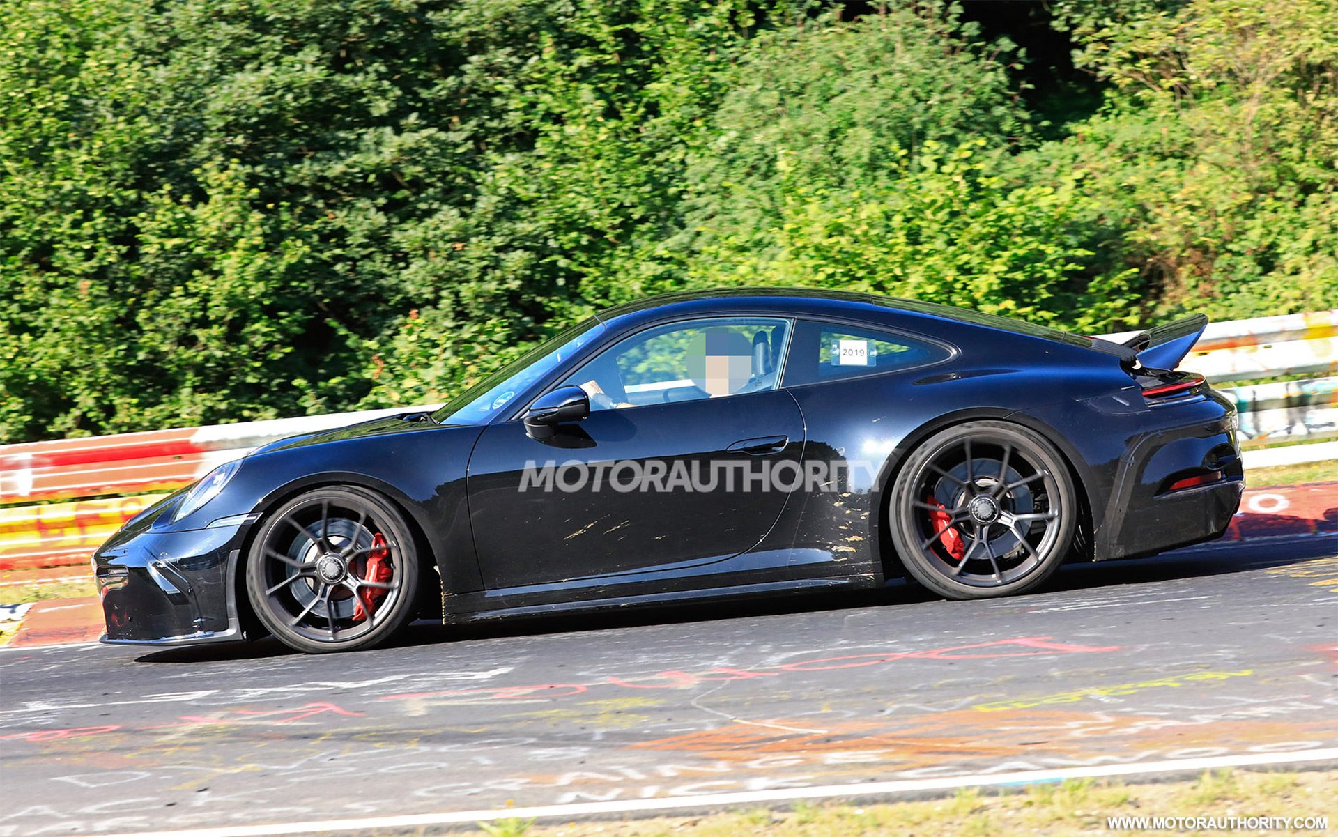 2021-porsche-911-gt3-touring-spy-shots--photo-credit-s-baldauf-sb-medien_100712513_h.jpg