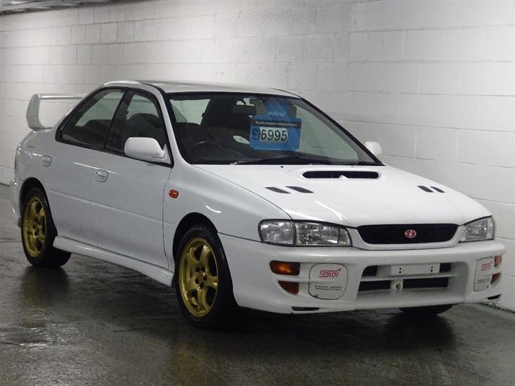 subaru-impreza-2-0-wrx-sti-5-version-5-red-top-280-bhp-267837388-1.jpg