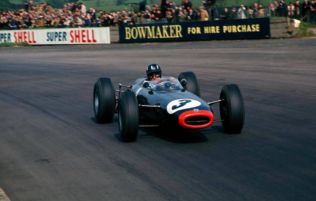 graham_hill__great_britain_1965__by_f1_history-daevep0.jpg