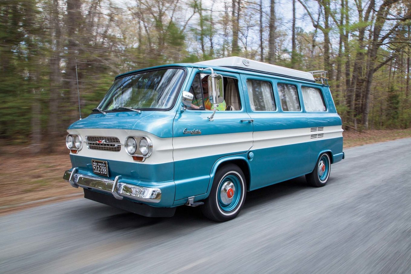 1964-Chevrolet-Corvair-Greenbrier-front-three-quarters-in-motion.jpg