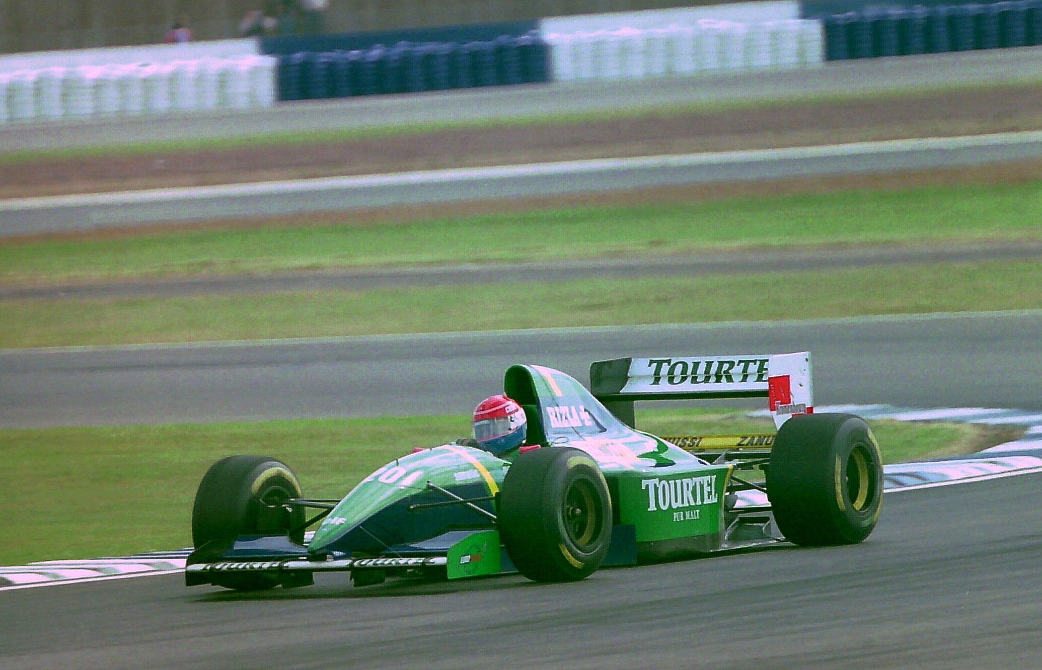 Eric_Comas_-_Larrousse_LH94_at_the_1994_British_Grand_Prix_%2832418647801%29.jpg