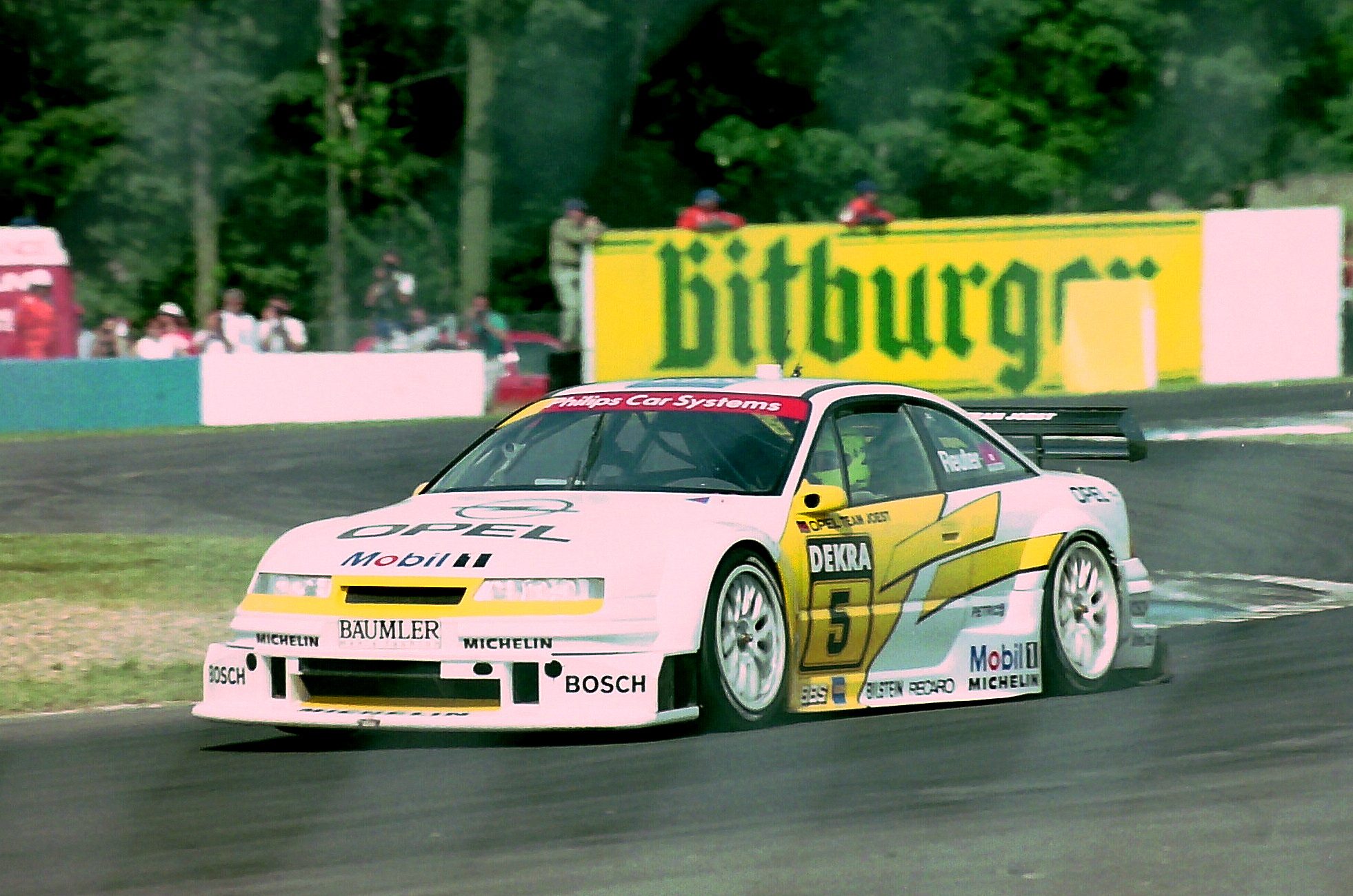 Manuel_Reuter_-_Opel_Team_Joest_-_Opel_Calibra_V6_exits_The_Esses_%2832869934428%29.jpg