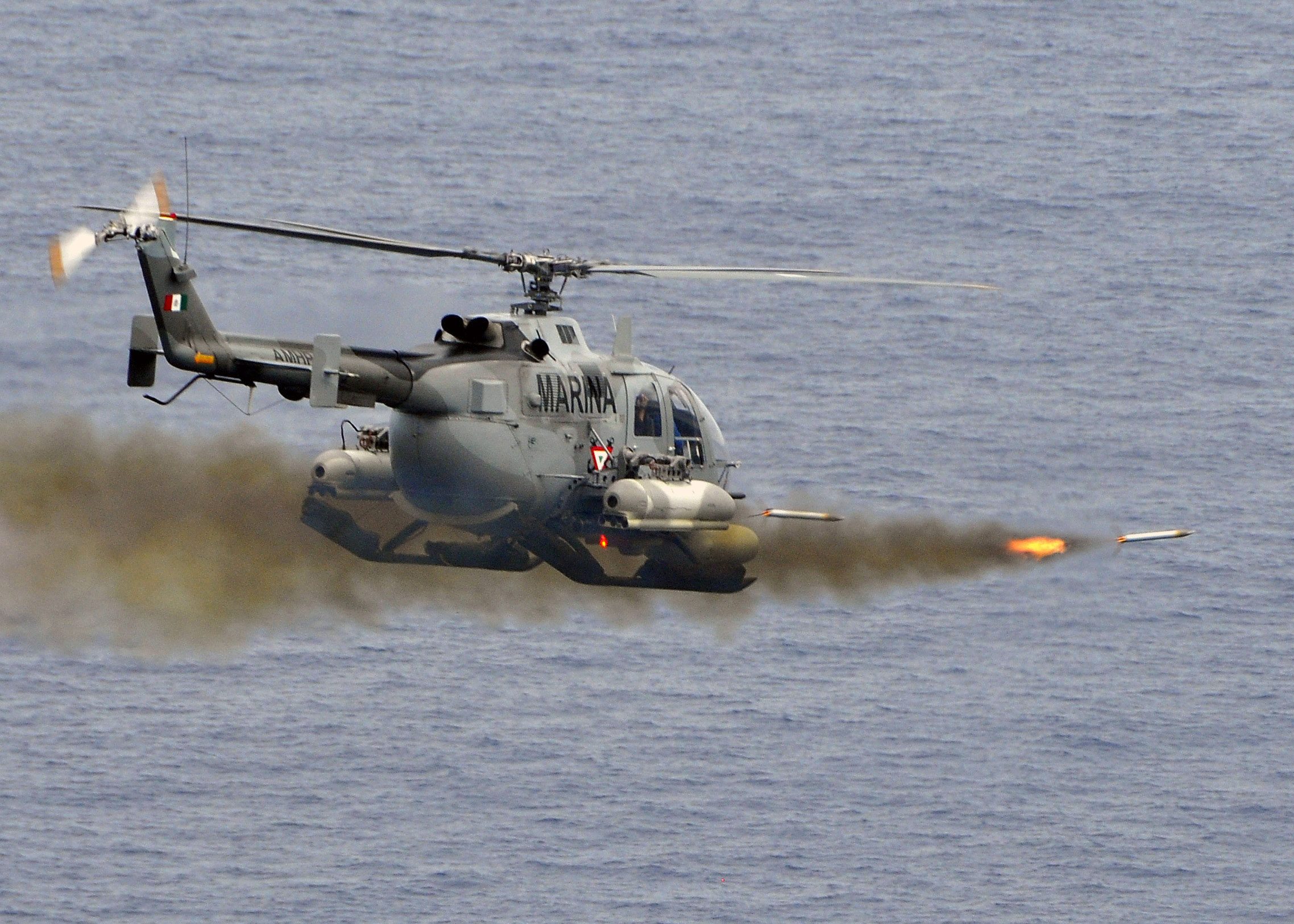 Mexican_BO-105_Bolkow_helicopter_fires_2.75_inch_high-explosive_rockets_at_the_ex-USS_Connolly_(DD_979).jpg