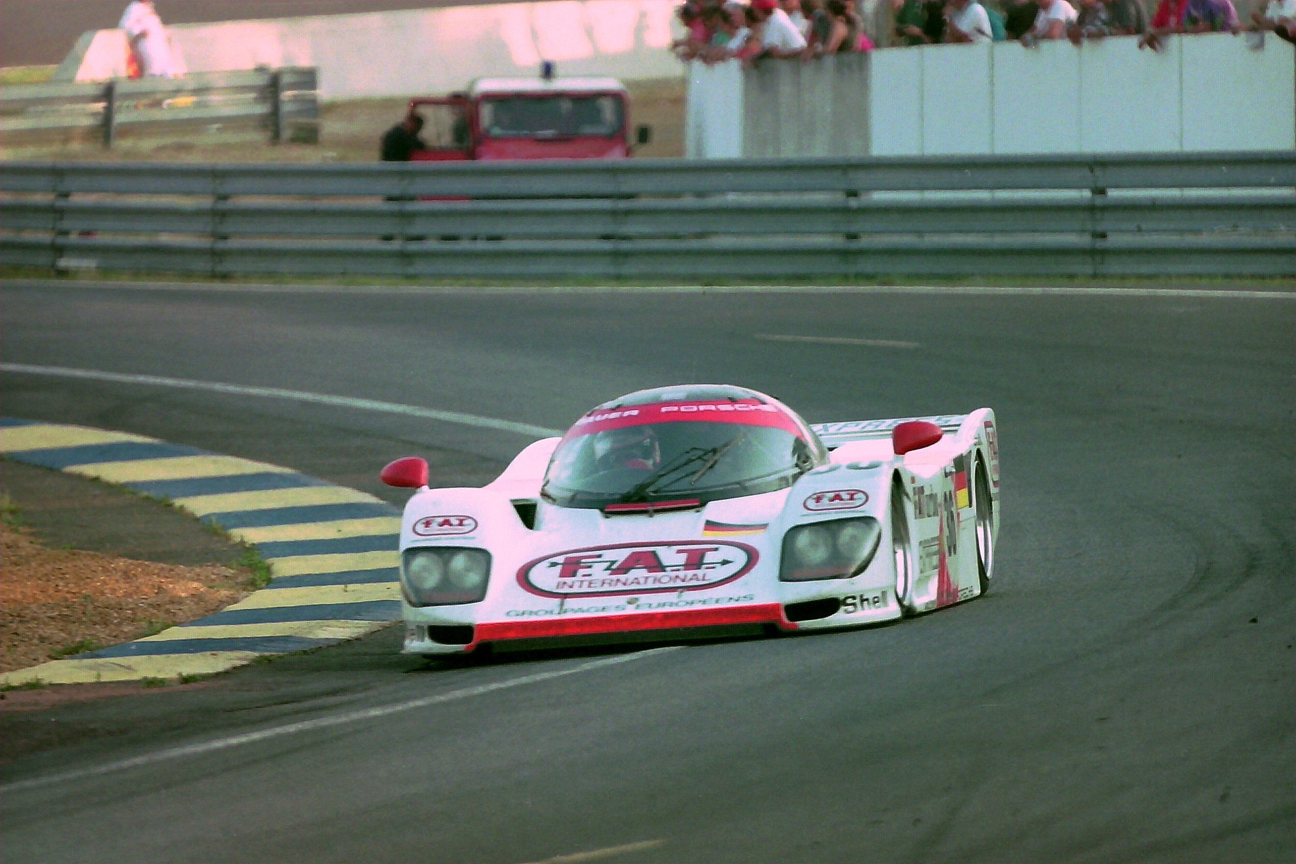 Dauer_962_LM_-_Mauro_Baldi%2C_Yannick_Dalmas_%26_Hurley_Haywood_in_the_Esses_at_the_1994_Le_Mans_%2831130424354%29.jpg