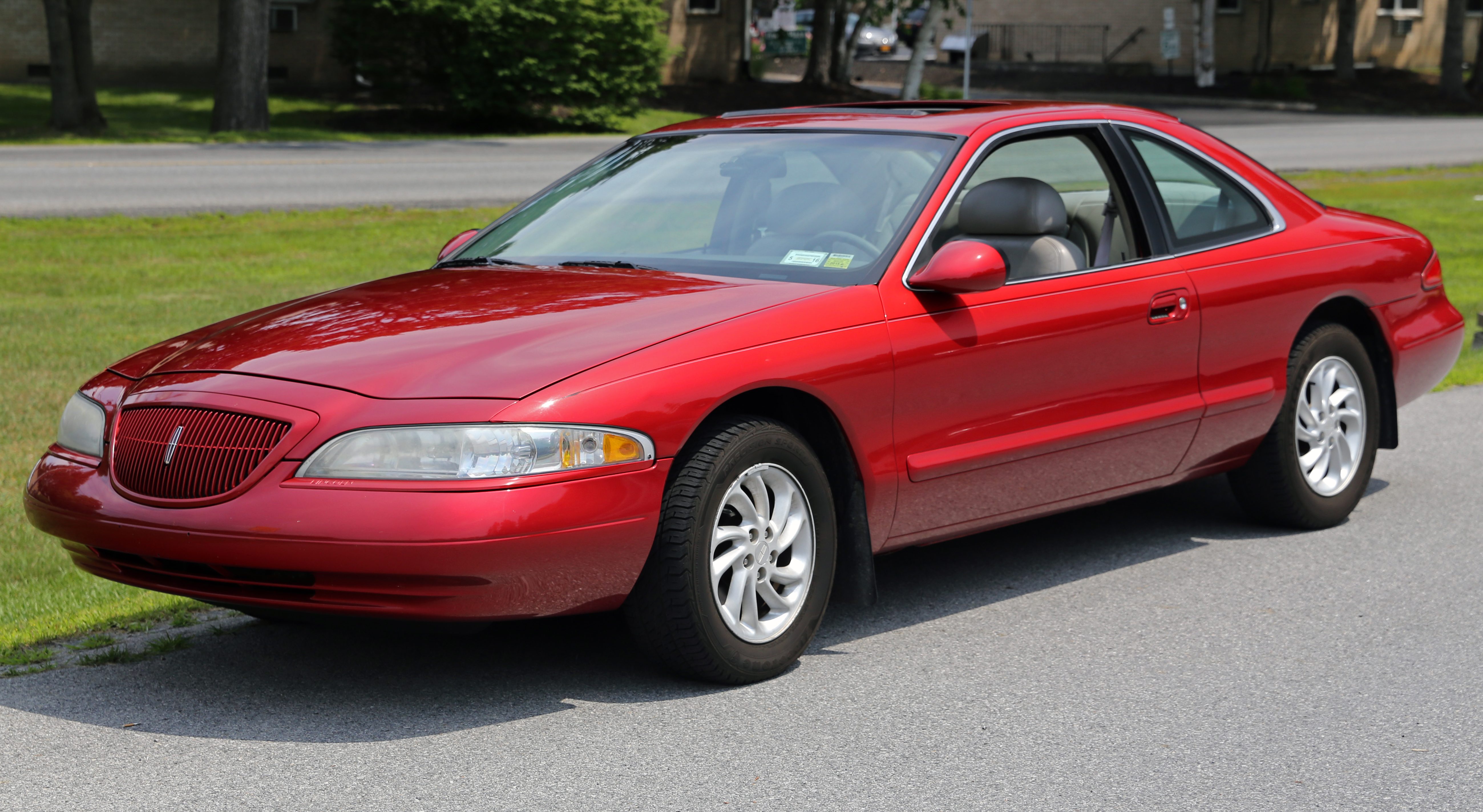 1998_Lincoln_Mark_VIII_LSC_in_red%2C_front_left.jpg