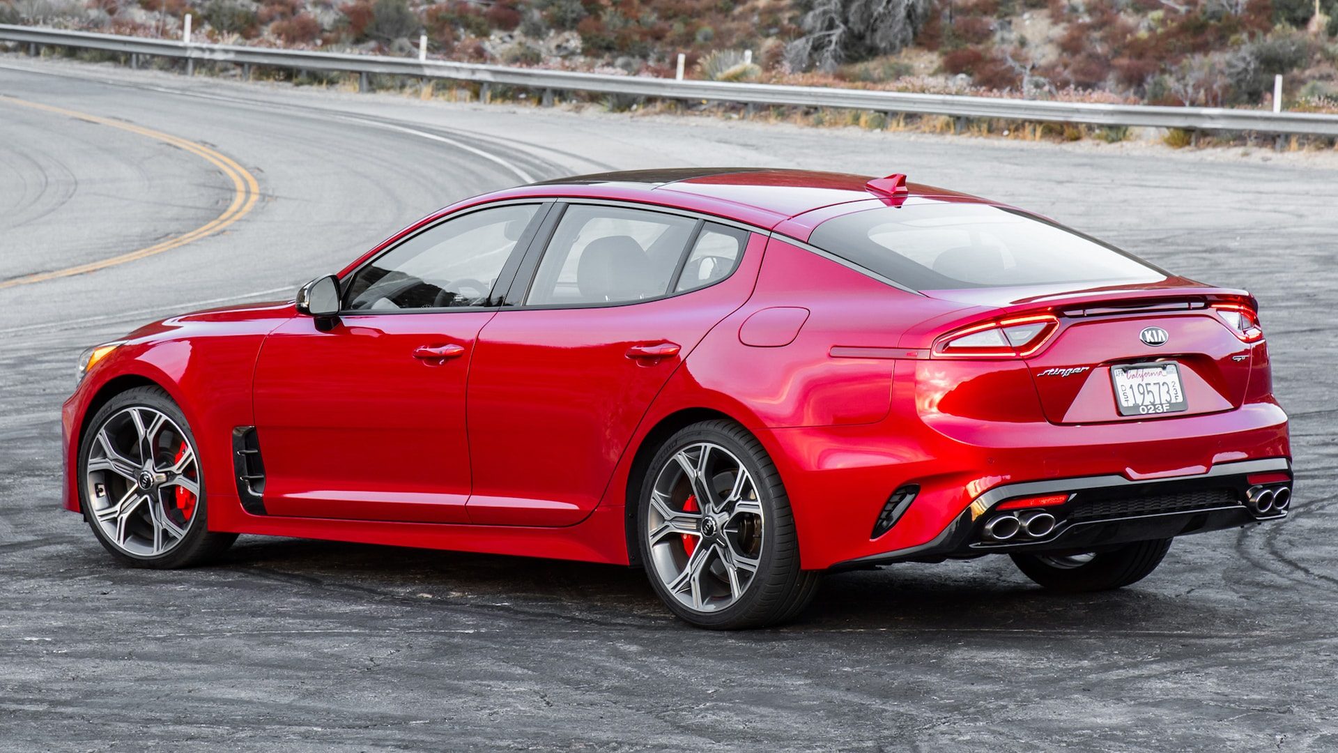 2018-Kia-Stinger-GT-rear-three-quarter-1.jpg